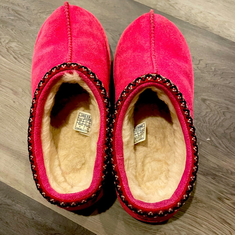 Kids Pink Ugg Slip ons.
